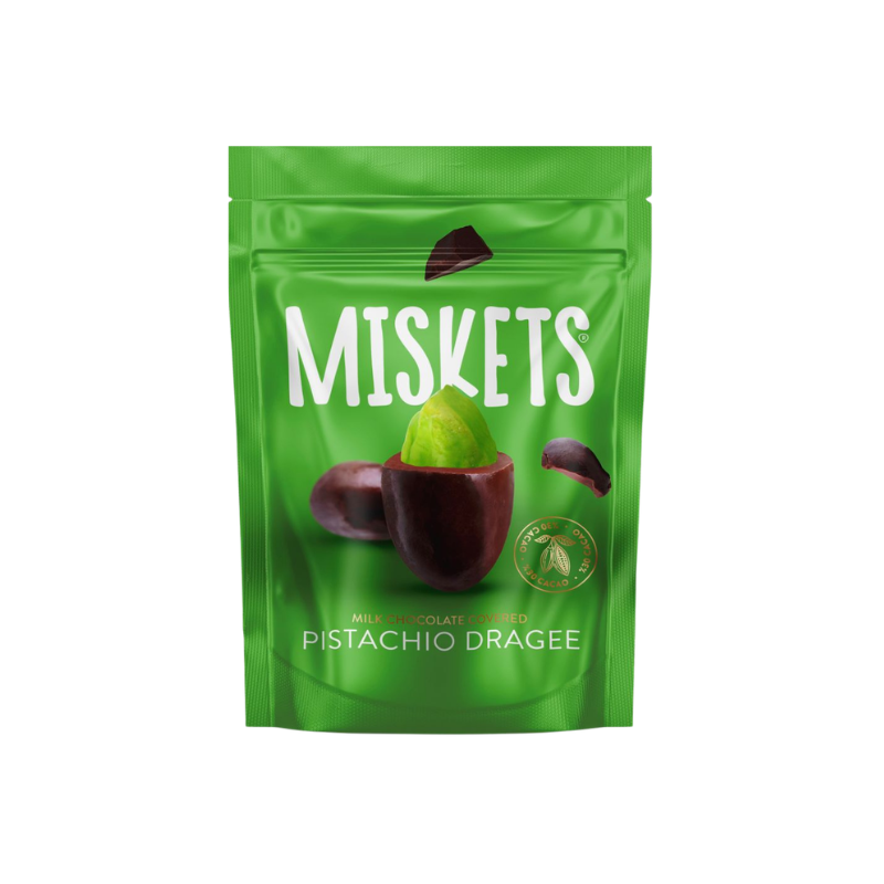 Green package of Miskets pistachio dragee on a white background