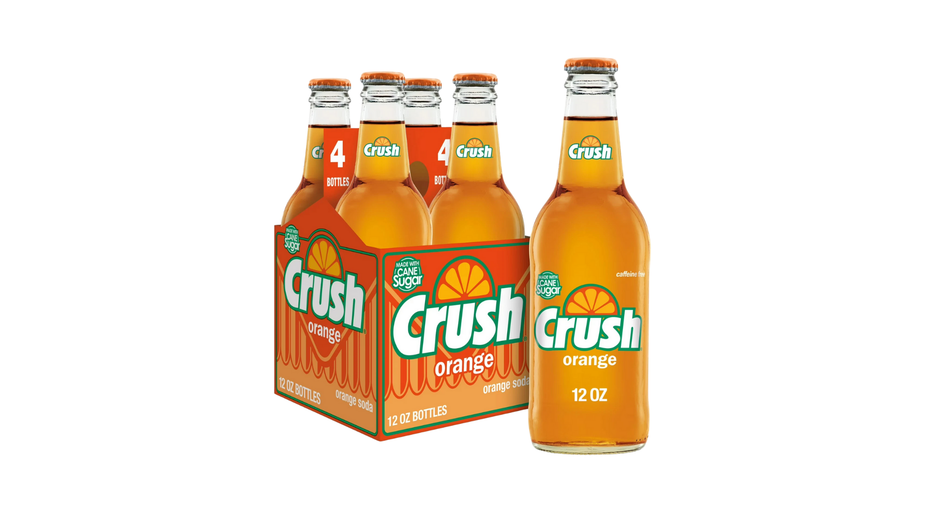 Pack of Crush orange soda bottles on a white background