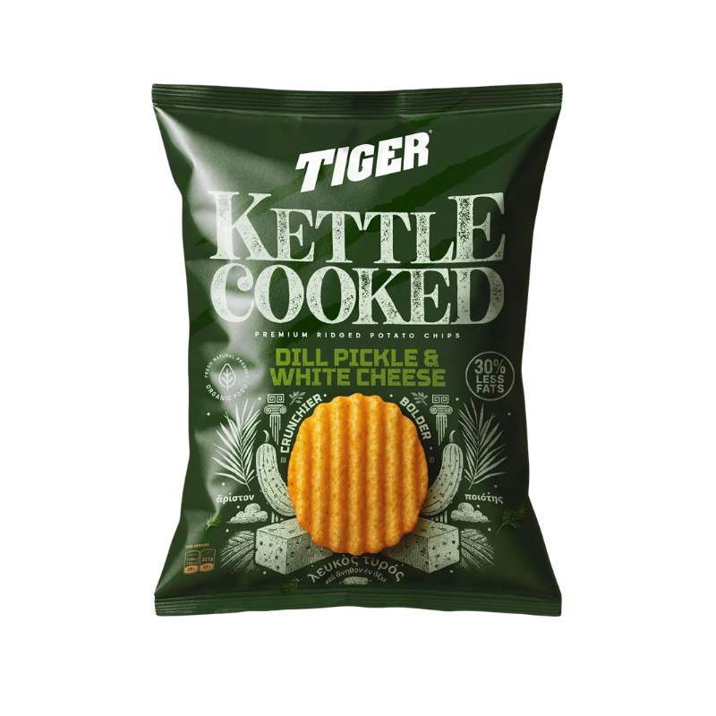 Green packet of Tiger kettle cooked chips with dill pickle and white cheese flavor on a white background
